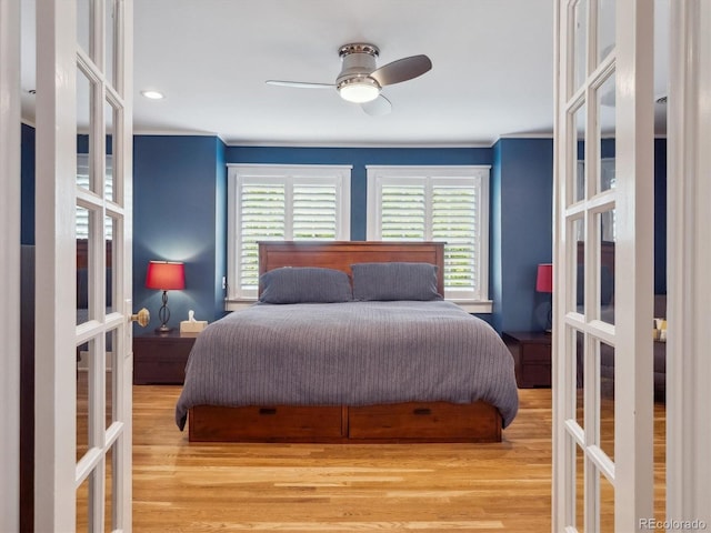 724 N Franklin St, Denver, CO 80218 - bedroom featuring french doors, wood finished floors, crown molding, and ceiling fan