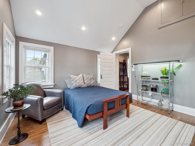 724 N Franklin St, Denver, CO 80218 - bedroom featuring vaulted ceiling, baseboards, wood finished floors, and recessed lighting
