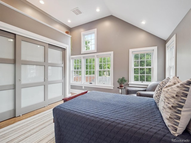 724 N Franklin St, Denver, CO 80218 - bedroom featuring light wood-style floors, vaulted ceiling, and recessed lighting
