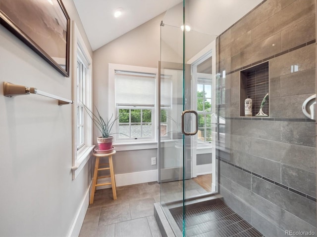724 N Franklin St, Denver, CO 80218 - full bath featuring baseboards, a shower stall, and vaulted ceiling