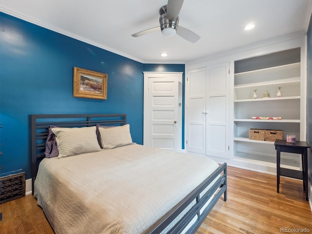 724 N Franklin St, Denver, CO 80218 - bedroom with wood finished floors, ornamental molding, a ceiling fan, recessed lighting, and baseboards