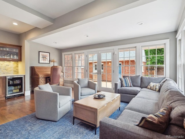724 N Franklin St, Denver, CO 80218 - living area with wine cooler, a dry bar, wood finished floors, and recessed lighting