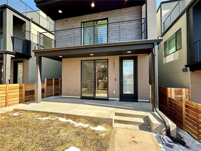 rear view of house with a patio