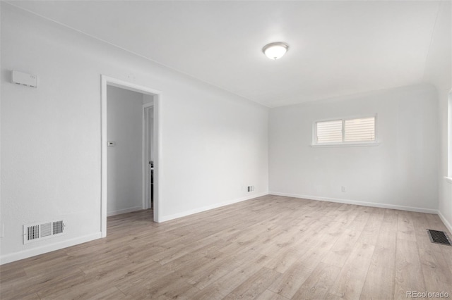 unfurnished room featuring light hardwood / wood-style flooring