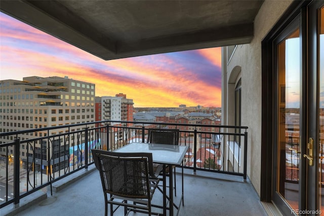 view of balcony at dusk