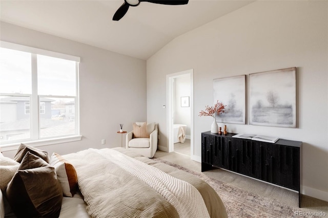 bedroom featuring a ceiling fan, lofted ceiling, light colored carpet, and baseboards