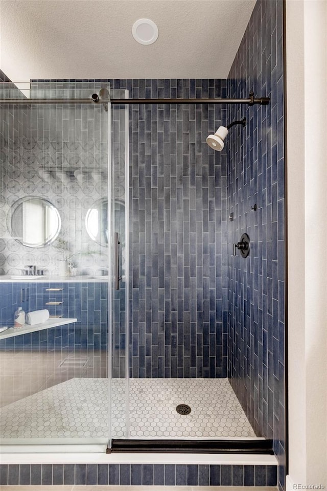 bathroom with a stall shower