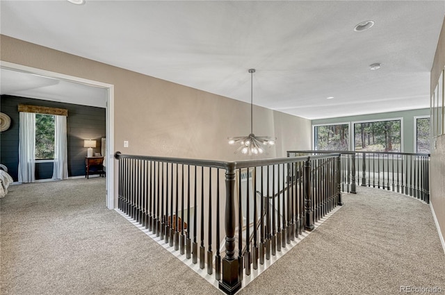 1410 Old Sequoia Ct, Franktown, CO 80116 - hall featuring carpet, plenty of natural light, and recessed lighting
