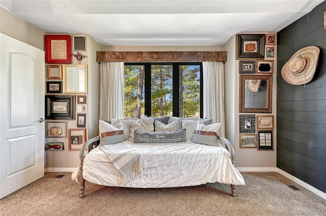 1410 Old Sequoia Ct, Franktown, CO 80116 - bedroom featuring carpet flooring and wood walls
