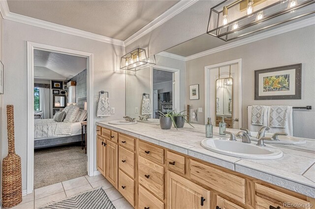 1410 Old Sequoia Ct, Franktown, CO 80116 - ensuite bathroom with tile patterned floors, double vanity, ornamental molding, and a textured ceiling