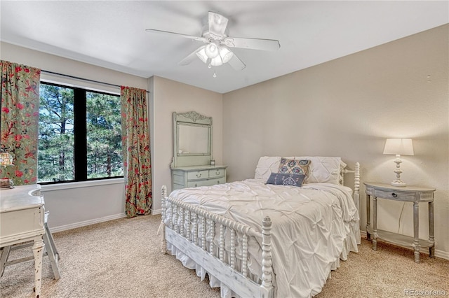 1410 Old Sequoia Ct, Franktown, CO 80116 - bedroom featuring light carpet, baseboards, and a ceiling fan