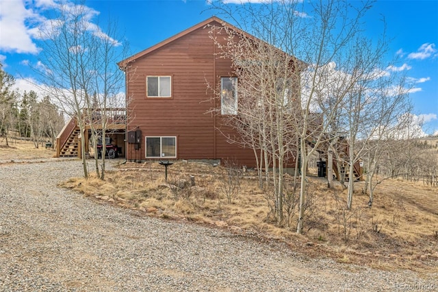 2418 Wells Fargo Cir, Jefferson, CO 80456 - view of side of property featuring stairs and a deck