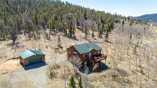 2418 Wells Fargo Cir, Jefferson, CO 80456 - aerial view of property and surrounding area with a forest and a mountain backdrop