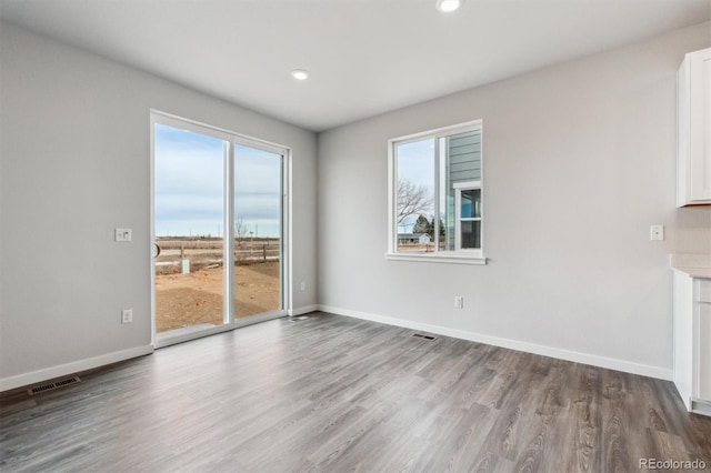 14424 Heritage Dr, Mead, CO 80504 - unfurnished dining area featuring wood finished floors and recessed lighting