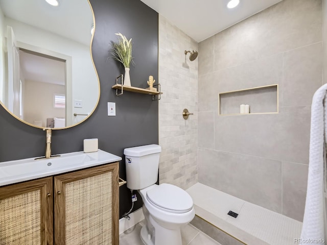 920 S Hudson St, Denver, CO 80246 - full bath featuring tiled shower, toilet, vanity, tile patterned floors, and recessed lighting