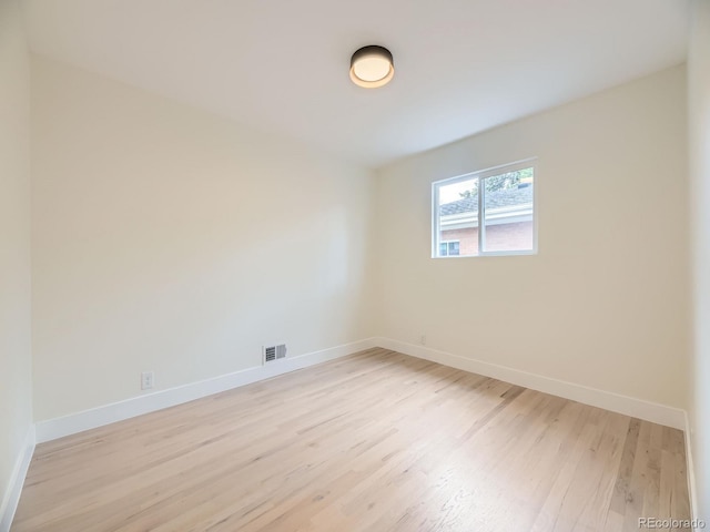 920 S Hudson St, Denver, CO 80246 - unfurnished room featuring light wood finished floors and baseboards