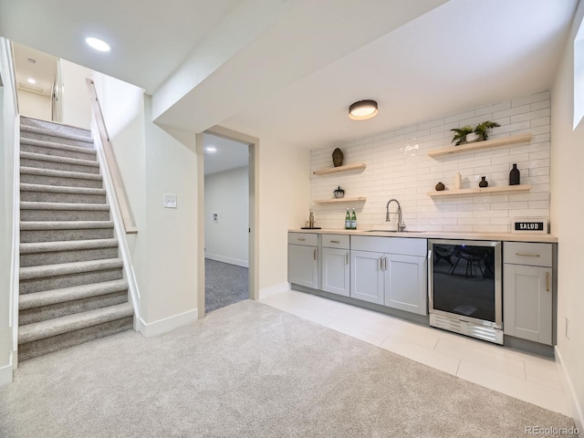 920 S Hudson St, Denver, CO 80246 - indoor wet bar with wine cooler, light carpet, stairs, tasteful backsplash, and recessed lighting