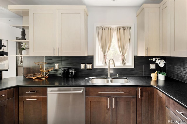 kitchen with stainless steel dishwasher, a sink, open shelves, dark countertops, and backsplash