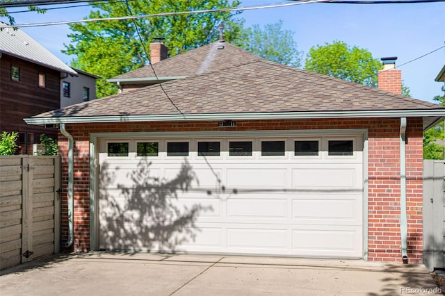 garage with fence