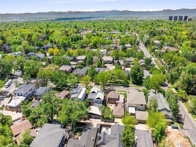 aerial perspective of suburban area featuring a mountainous background