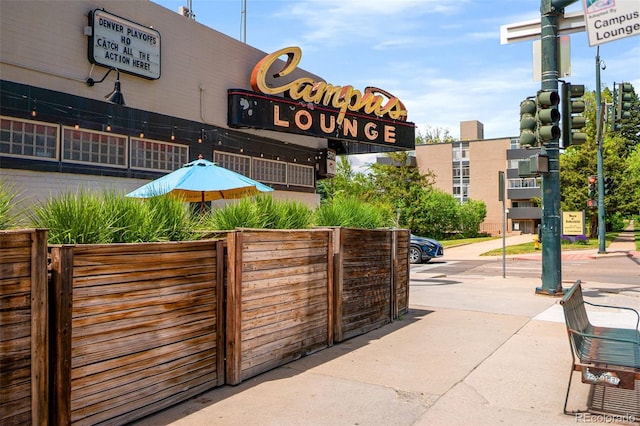 view of community featuring fence