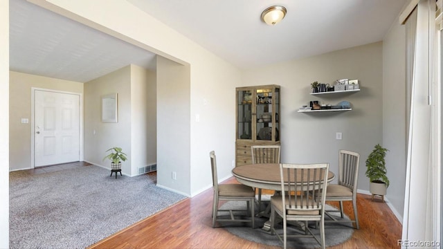 dining room featuring dark hardwood / wood-style floors