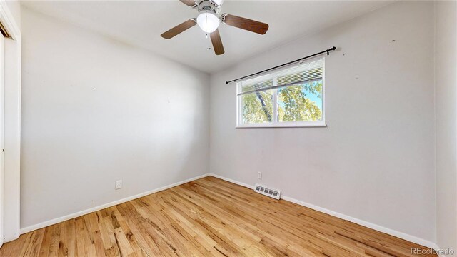 empty room featuring light hardwood / wood-style floors and ceiling fan