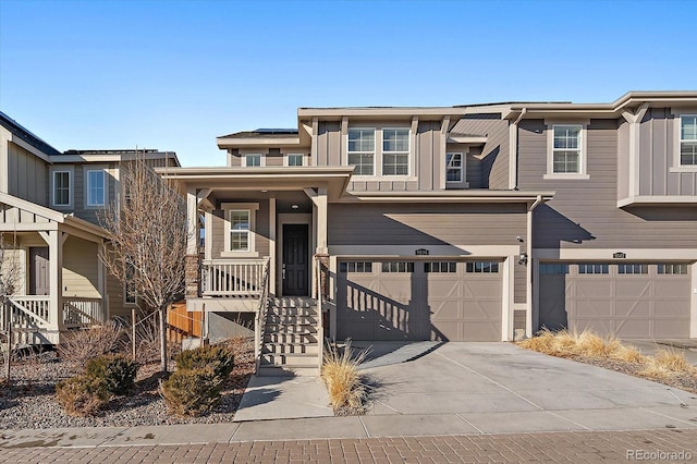 view of front facade with a garage and concrete driveway