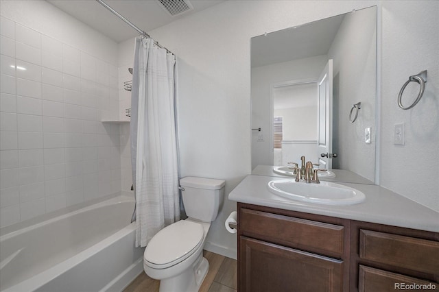 full bathroom featuring shower / bath combination with curtain, visible vents, toilet, vanity, and wood finished floors