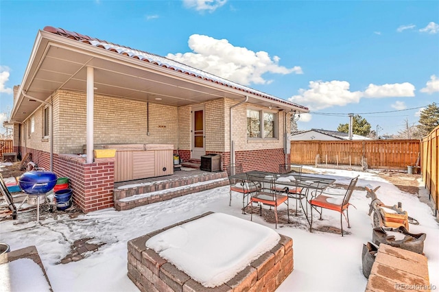 view of snow covered patio