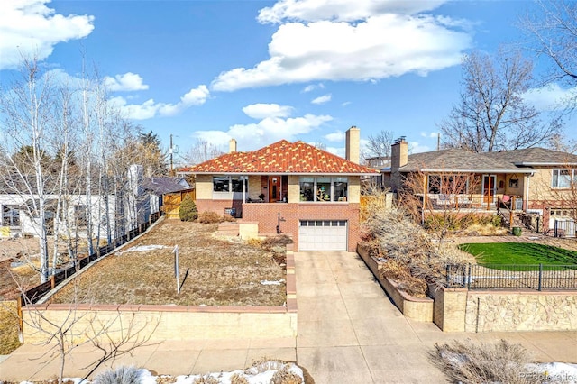 view of front of home featuring a garage and covered porch