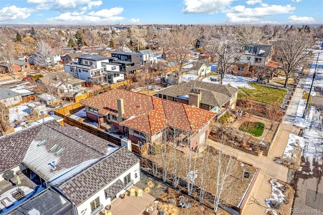 birds eye view of property with a residential view