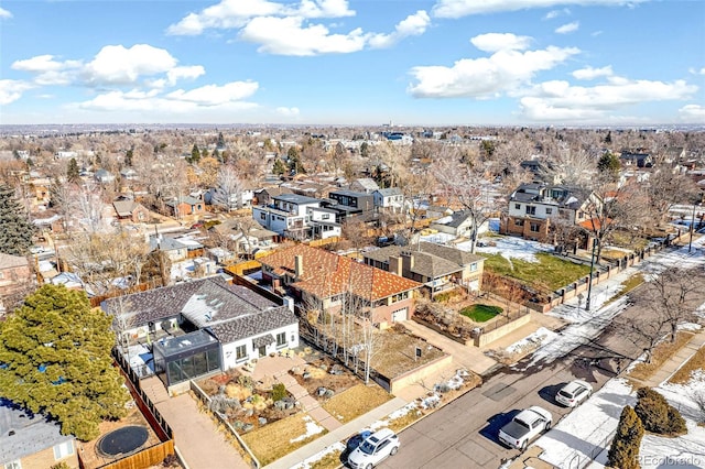 birds eye view of property with a residential view