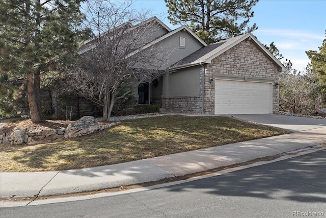 view of front of home featuring a garage, concrete driveway, stone siding, stucco siding, and a front yard