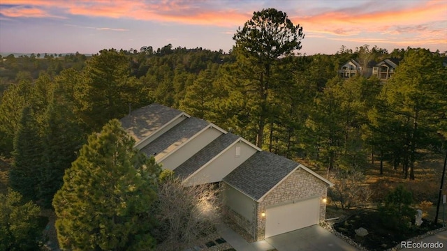 7649 Pineridge Ter, Castle Pines, CO 80108 - aerial overview of property's location featuring a forest