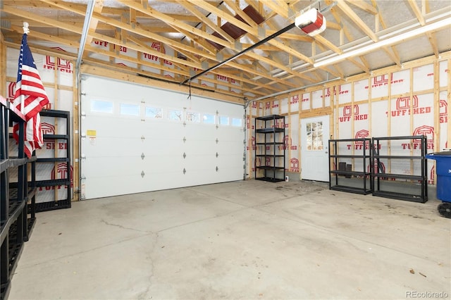 garage featuring a garage door opener