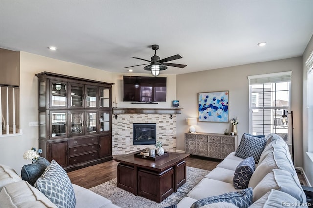 living area featuring recessed lighting, a ceiling fan, and dark wood-style floors