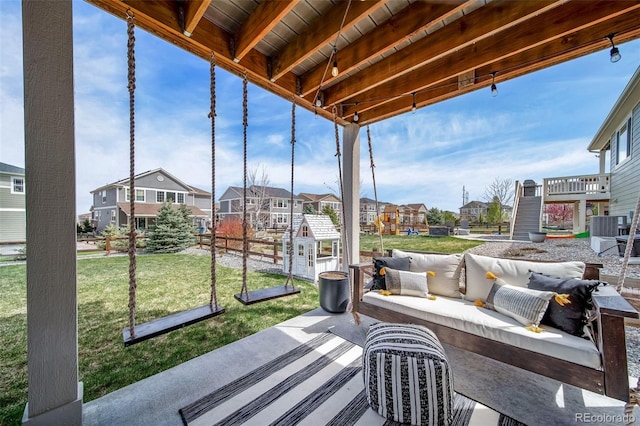 view of patio / terrace featuring a residential view and an outdoor hangout area