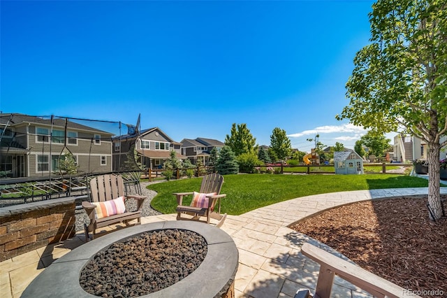 23879 E Narrowleaf Pl, Aurora, CO 80016 - view of patio / terrace with a residential view and an outdoor fire pit