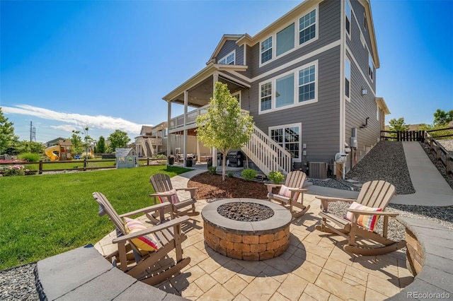 23879 E Narrowleaf Pl, Aurora, CO 80016 - view of patio / terrace featuring an outdoor fire pit and stairs