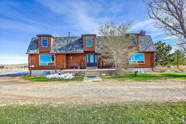 view of log cabin