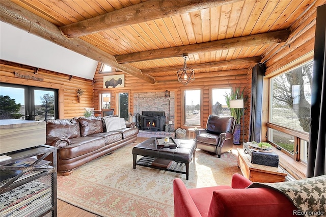 living room with french doors, beam ceiling, wooden ceiling, log walls, and light hardwood / wood-style floors