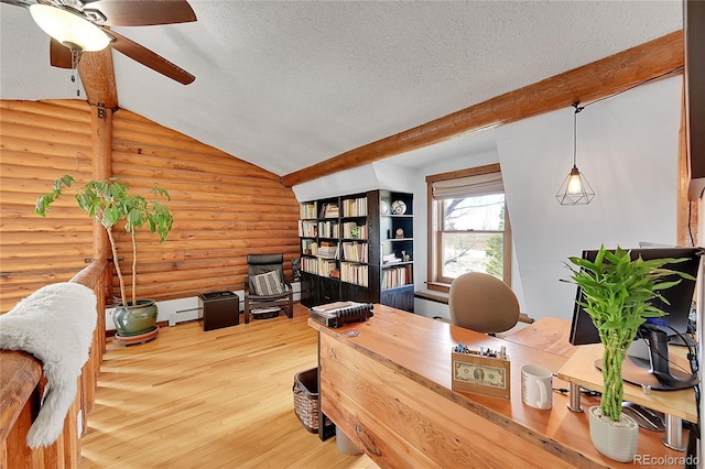 office space with vaulted ceiling, hardwood / wood-style floors, rustic walls, ceiling fan, and a textured ceiling