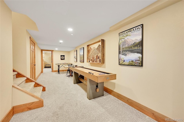 recreation room featuring carpet flooring