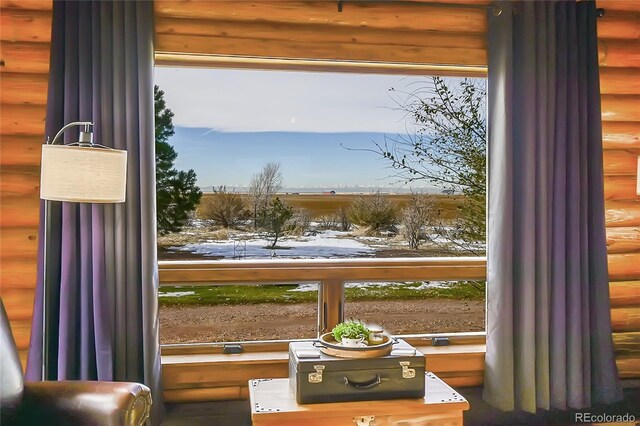48155 E 56th Ave, Bennett, CO 80102 - doorway with rustic walls and decorative columns