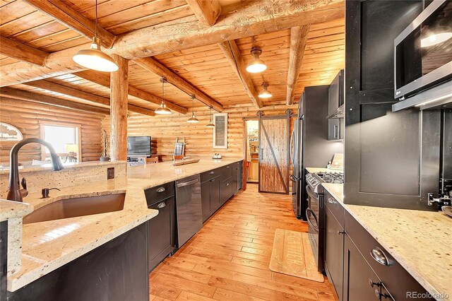 48155 E 56th Ave, Bennett, CO 80102 - kitchen featuring wooden ceiling with exposed beams, log walls, appliances with stainless steel finishes, a sink, and light wood finished floors