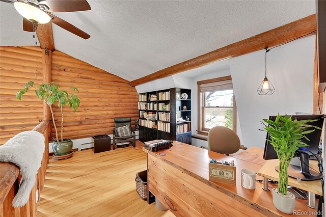 48155 E 56th Ave, Bennett, CO 80102 - home office featuring rustic walls, ceiling fan, a textured ceiling, wood finished floors, and vaulted ceiling