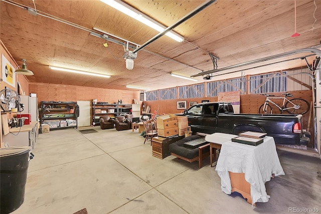 48155 E 56th Ave, Bennett, CO 80102 - garage featuring a garage door opener