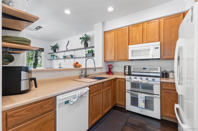 kitchen featuring a sink, recessed lighting, open shelves, and white appliances