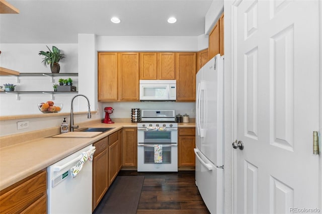 kitchen with dark wood-style flooring, open shelves, a sink, light countertops, and white appliances